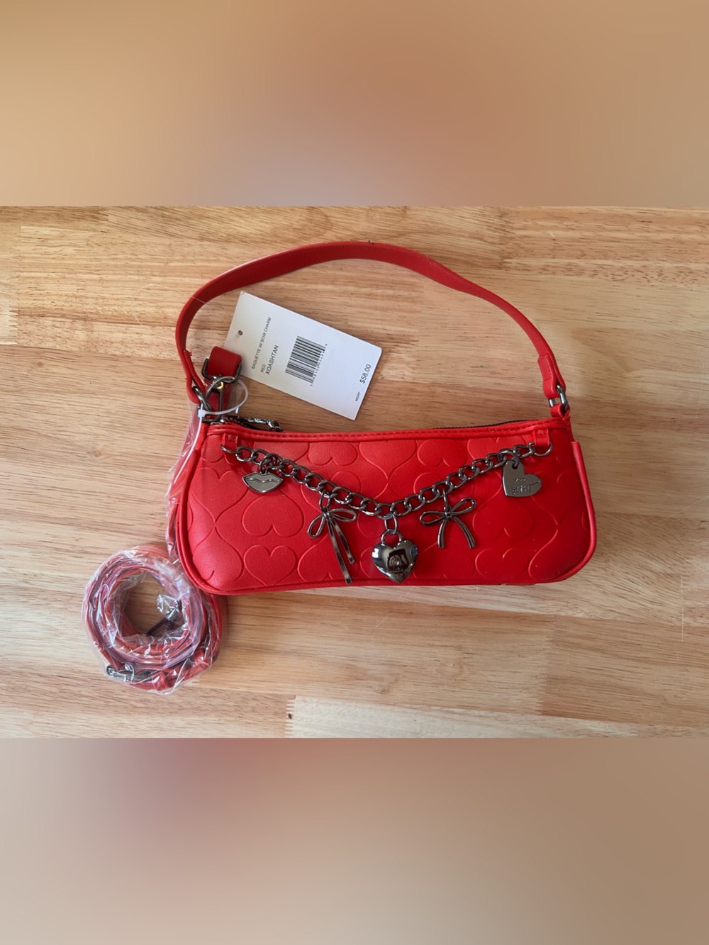 Betsey Johnson Red Heart-Embossed Mini Shoulder Bag with Charm Chain